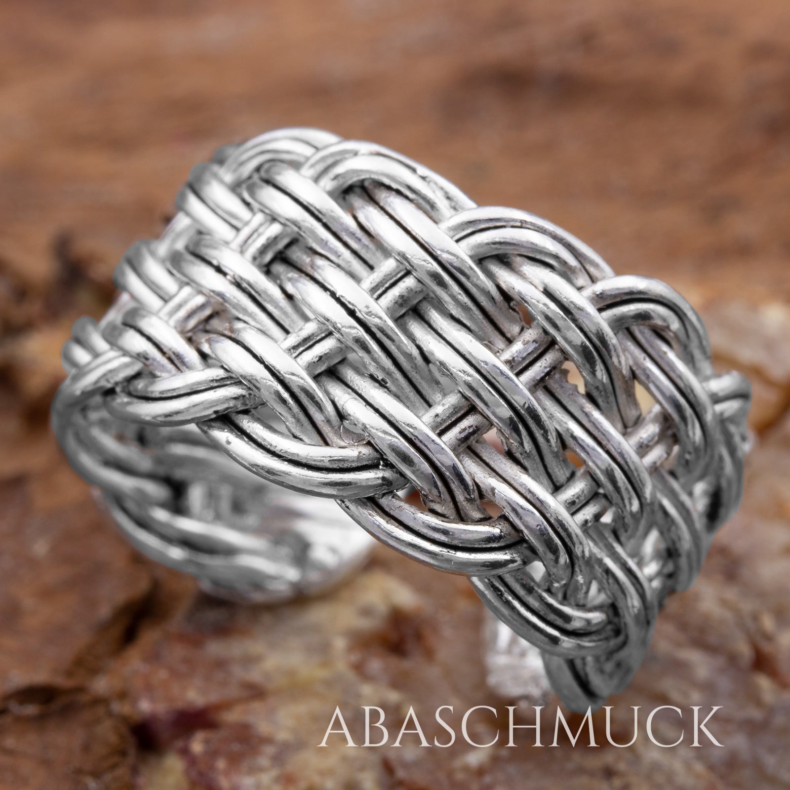 Verstellbarer breiter Bandring aus 925 Sterling Silber mit geflochtener Oberfläche und glänzender Struktur