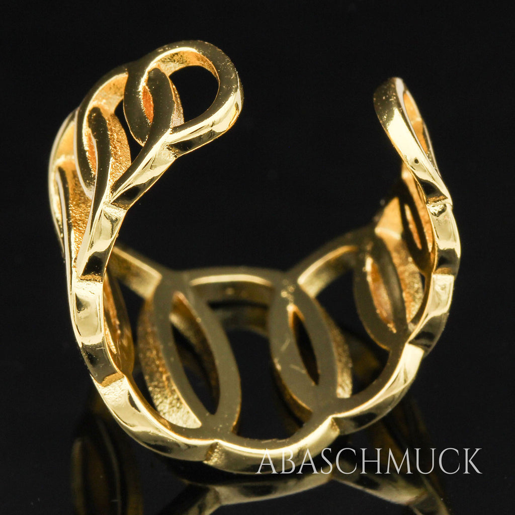 Offener vergoldeter Damenring aus 925 Sterling Silber mit grafischem Oval-Muster auf schwarzem Hintergrund