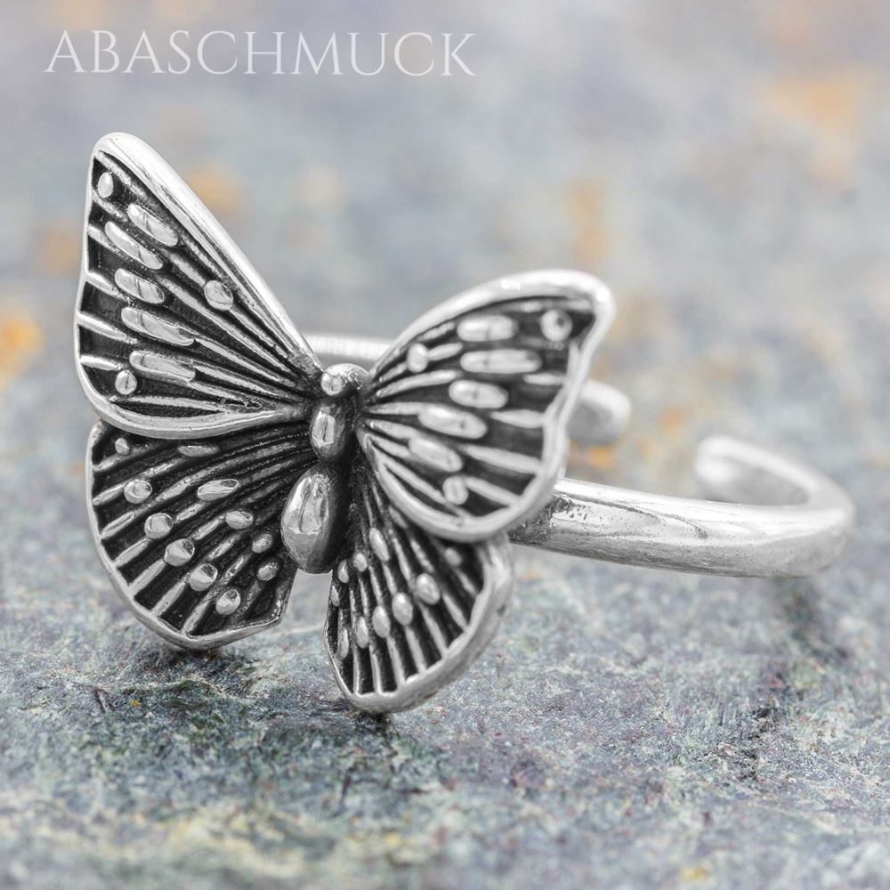 Detailreicher 925 Silberring mit Schmetterling auf Steinuntergrund