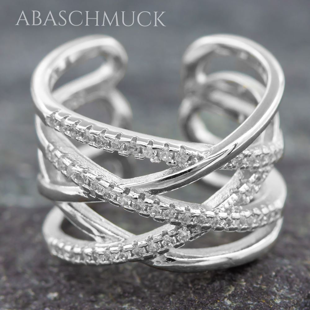 Breiter offener Bandring aus Sterling Silber mit funkelnden Details.