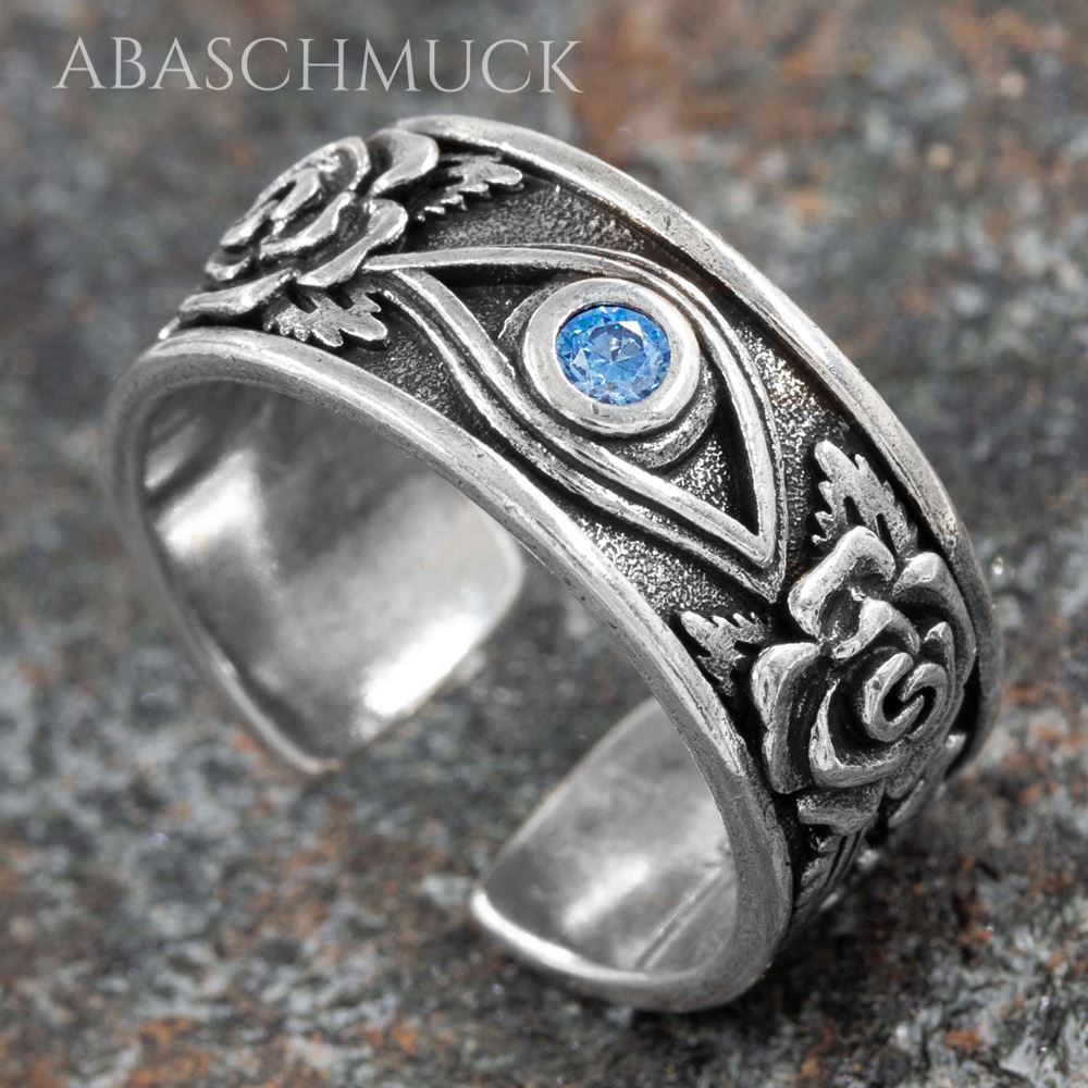 Antik wirkender Silberring 925 mit floralen Mustern und blauem Stein.
